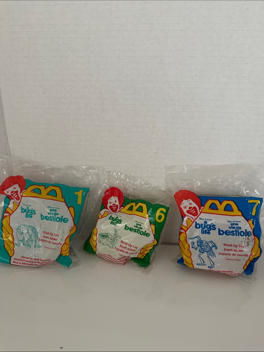 McDonald's Bugs Life Wind-Up Toys - Red, Green, Blue Packaging Set